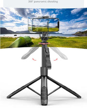 AI face tracking gimbal for panoramic shooting with smartphone holder and tripod.