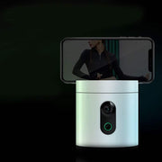AI face recognition smart follow-up gimbal with smartphone attached.