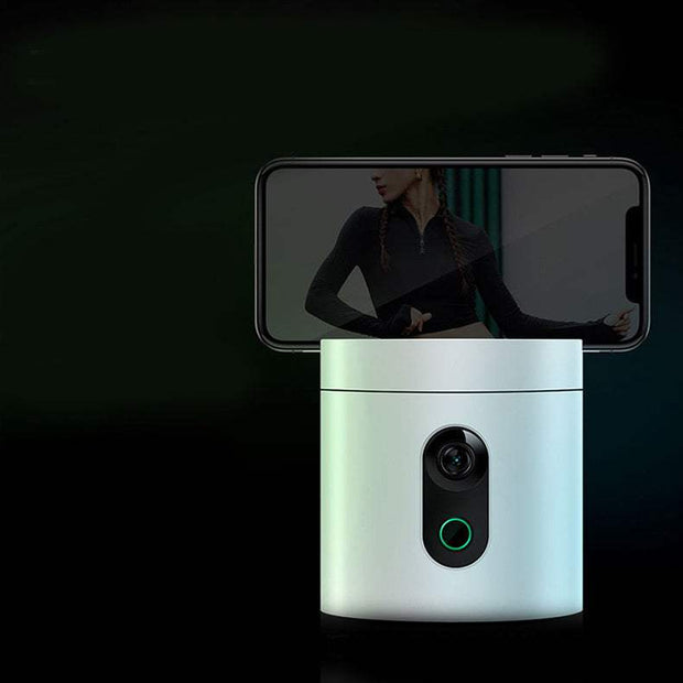 AI face recognition smart follow-up gimbal with smartphone attached.
