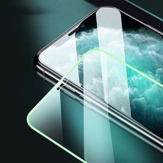 Luminous full cover tempered glass on smartphone screen, highlighting a glowing edge and high-definition clarity.