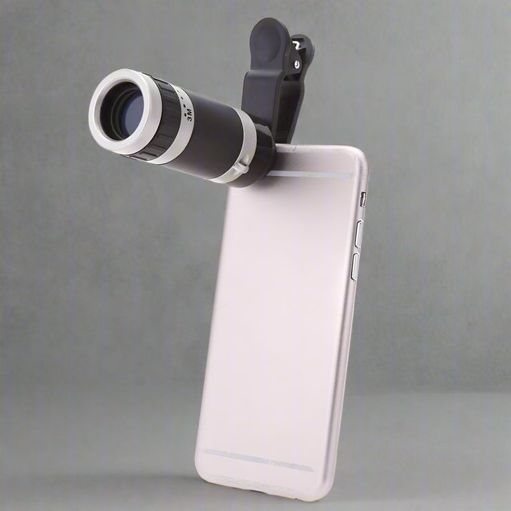 8X telescopic lens attached to a smartphone, made from ABS and optical glass.