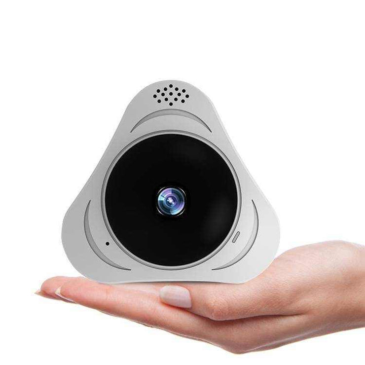 Smart home 3D panoramic security camera in hand, indoor use.