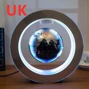 Floating globe with LED light in circular frame, UK plug option.