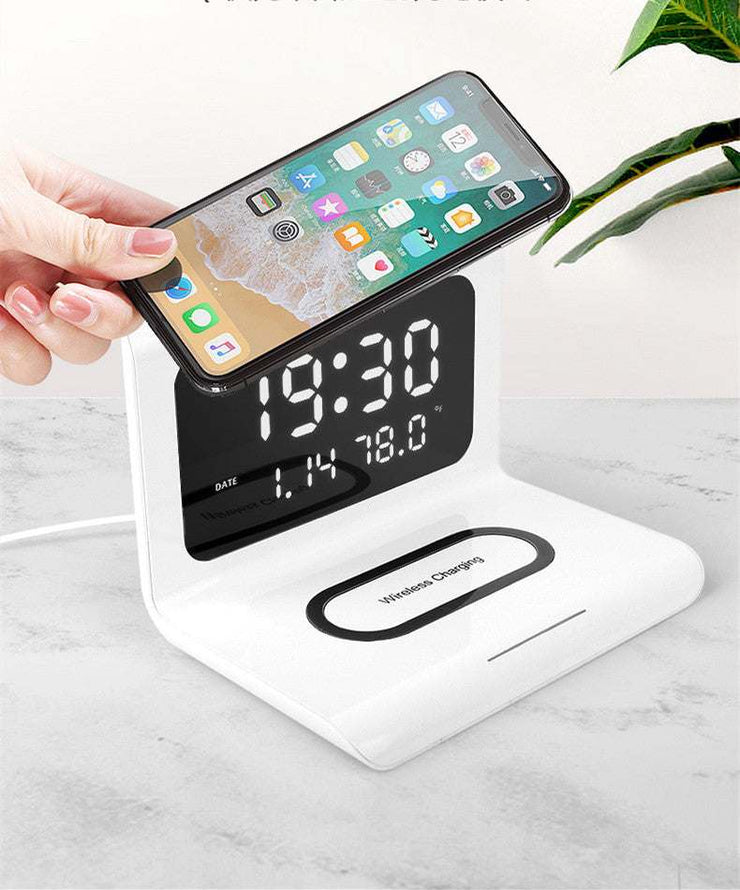 Wireless charger alarm clock with fast charging, perpetual calendar, temperature, and humidity display.