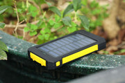 Ultra-thin solar charger for mobile phones in a natural setting.