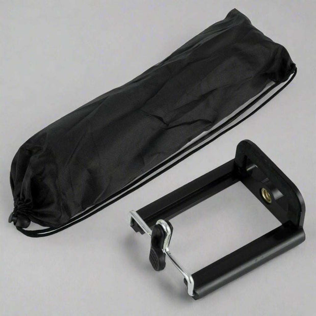 Professional camera tripod holder with nylon carry bag and universal mount.