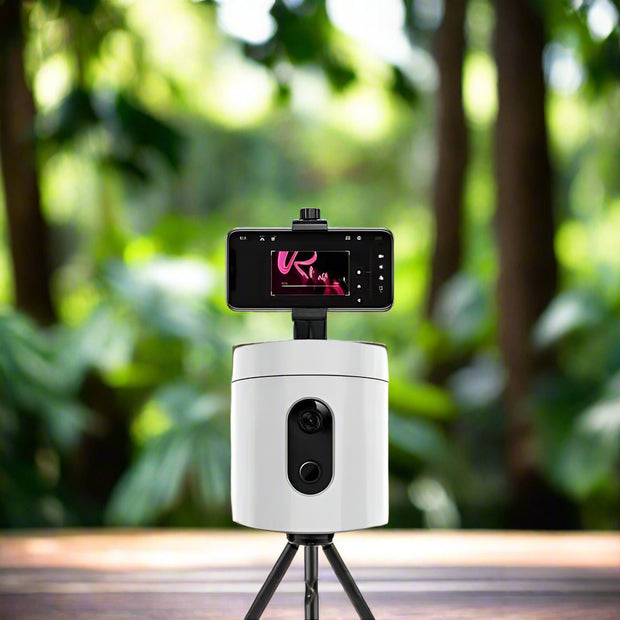 AI face recognition smart follow-up gimbal with smartphone mounted.
