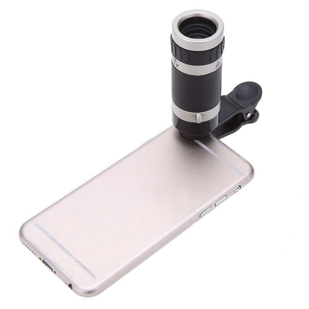 Telescopic lens attached to phone for 8X magnification.