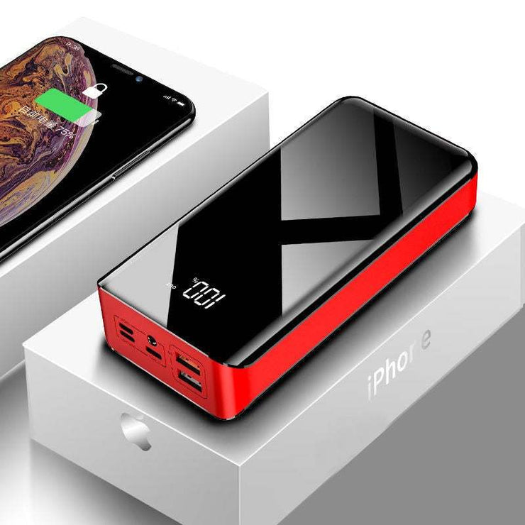 30000mAh power bank with LCD display and dual USB ports, black and red design.