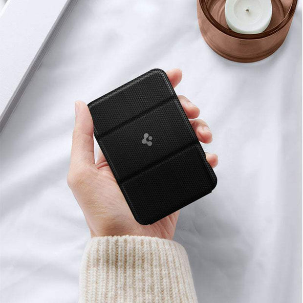 Classic black magnetic card holder for mobile phones.