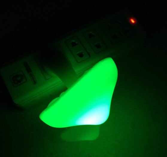 LED night light with light sensor in green, mushroom shape, EU US plug, ideal for home decor.