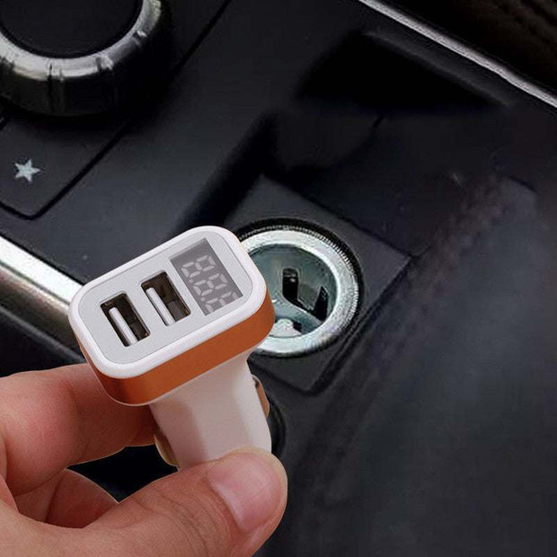 Multi-function car charger with digital display and dual USB ports in vehicle.