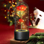 Creative 2-in-1 rose LED light and Bluetooth speaker in glass cover for romantic ambiance.