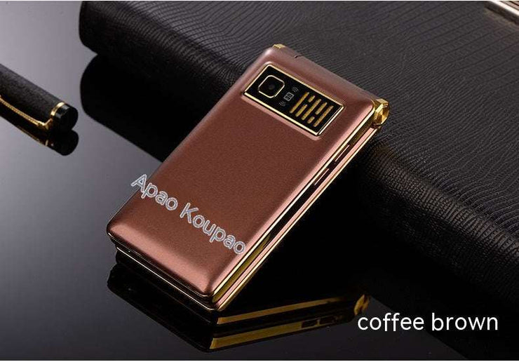 Coffee brown dual screen flip phone with elderly-friendly touch function on black surface.