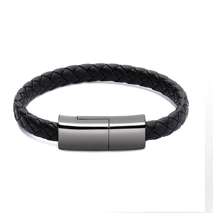 Black braided leather bracelet with hidden USB charging cable and zinc alloy connectors for versatile device charging.