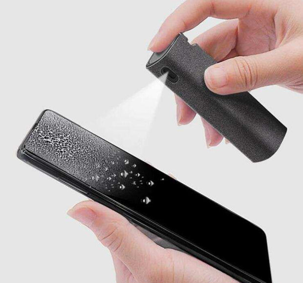 2 in 1 phone computer screen cleaner spraying on phone screen.