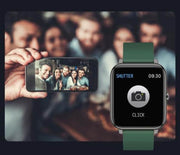 Green P22 smart watch displaying camera shutter control against a group photo background.