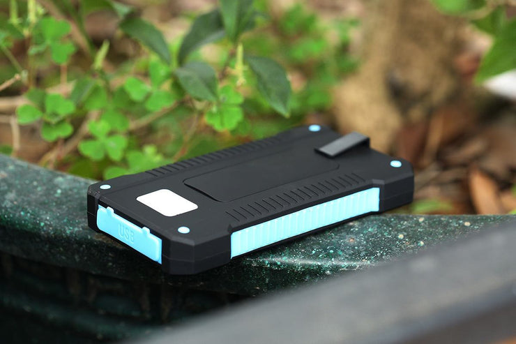 Universal ultra-thin solar charger for mobile phones outdoors.