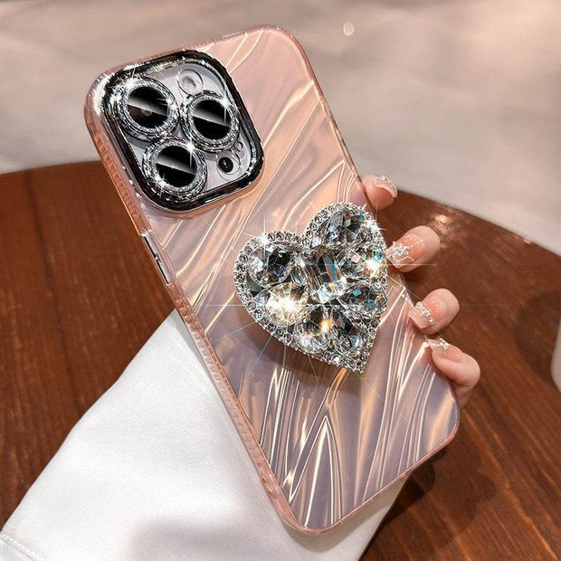 Silicone phone case with rhinestone love bracket and lens protector for iPhone.