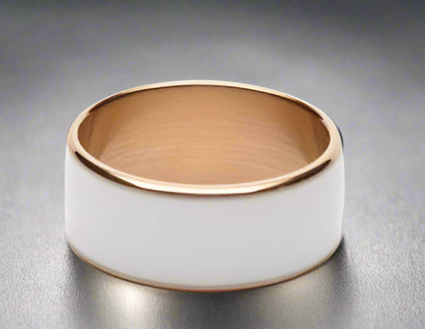 JAKCOM R3F Ring with gold band and white ceramic exterior on a white background
