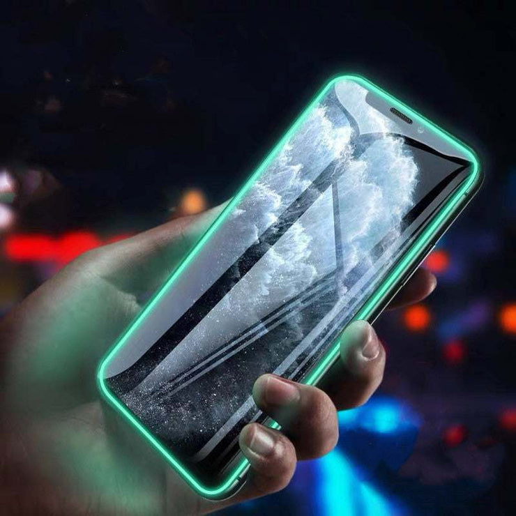 Luminous Full Cover Tempered Glass on Smartphone, glowing in the dark.