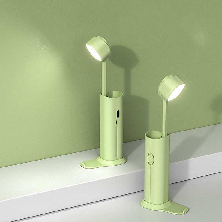 Green multi-function desk lamp with LED flashlight and power bank function.