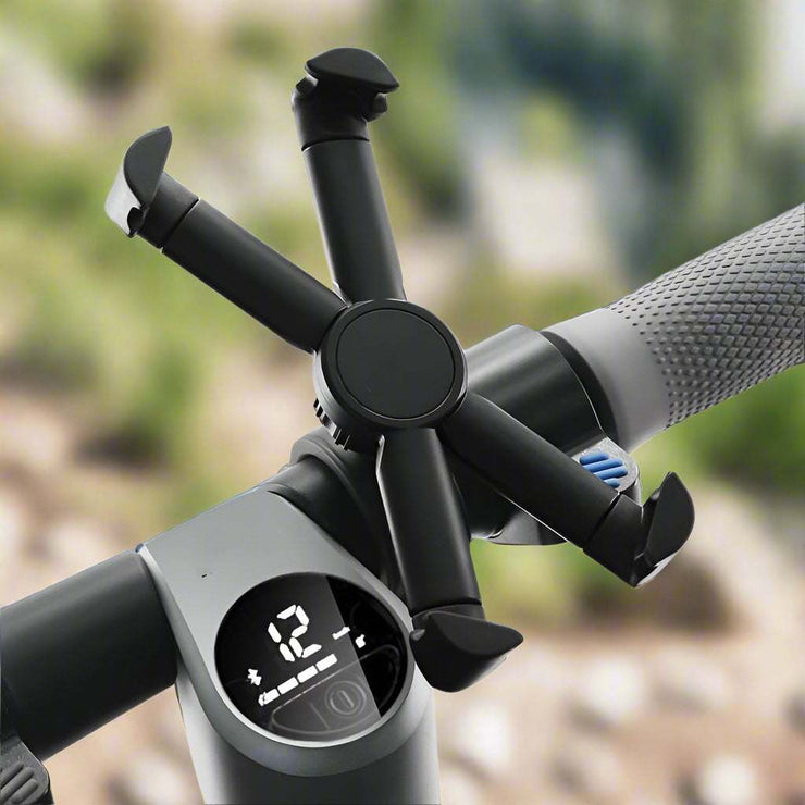 Mountain bike phone holder accessory on handlebars, suitable for 4.7-6.5 inch phones.