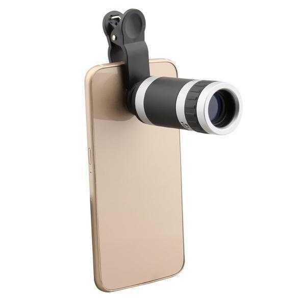 8X optical telescopic lens clipped onto smartphone for enhanced viewing.