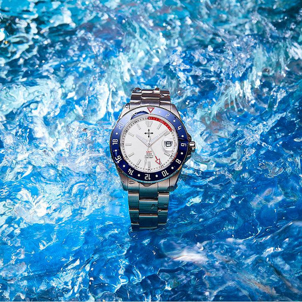 Stainless steel GMT luminous waterproof men's watch with white dial and blue bezel on water background