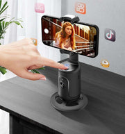 AI face tracking gimbal phone holder for stable smartphone video recording.