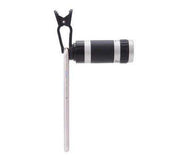 8X telescopic lens clipped onto a smartphone, made of ABS and optical glass, includes cleaning cloth.