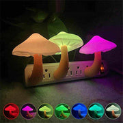 LED mushroom-shaped night lights plugged into a wall socket, emitting warm white light with various colors for home decoration.