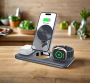 Folding magnetic wireless charger with desktop bracket for phone, watch, and headphones in black.