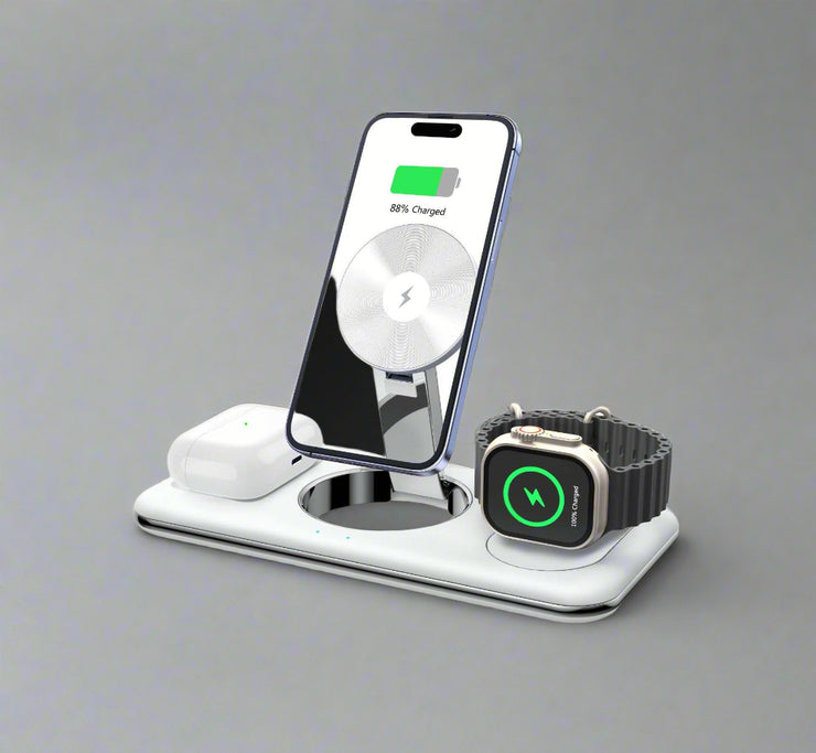 Folding magnetic wireless charger in white with smartphone, smartwatch, and headphone charging.