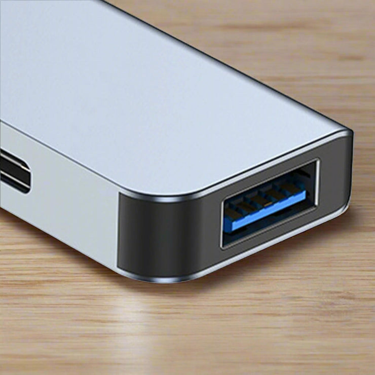 7 in 1 Type C Hub aluminum alloy USB docking station with charging port.