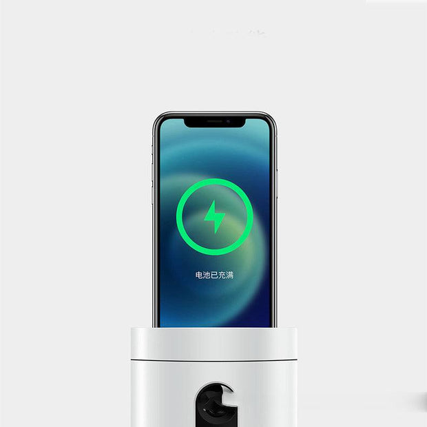 AI Face Recognition Smart Follow-up Gimbal with smartphone, showcasing face tracking and charging functionality.