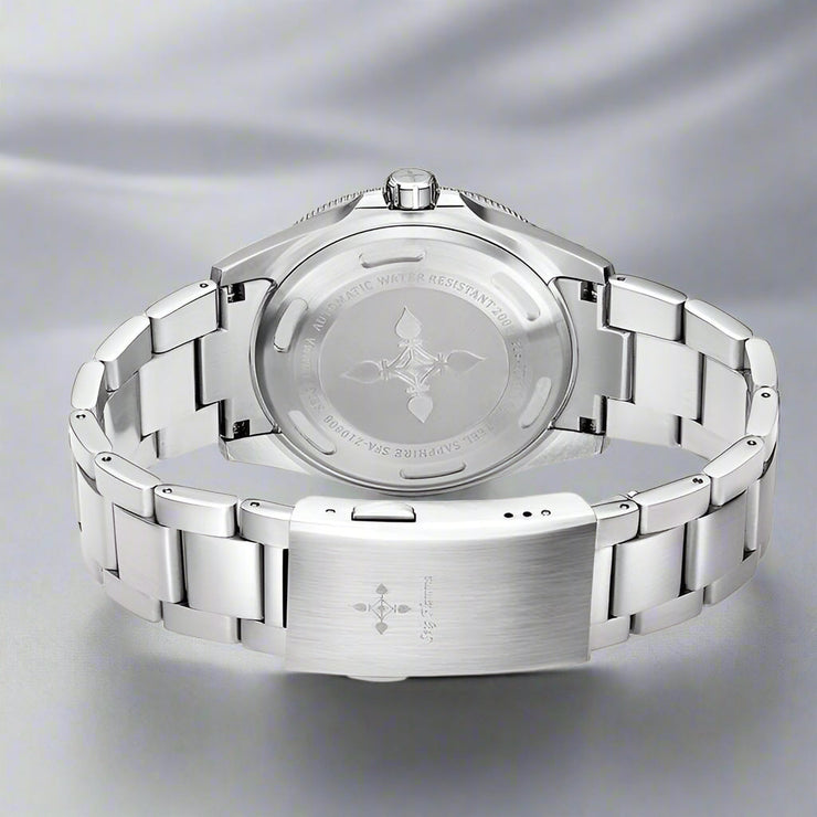 Back view of a stainless steel GMT luminous waterproof men's watch with sapphire glass and double press button clasp