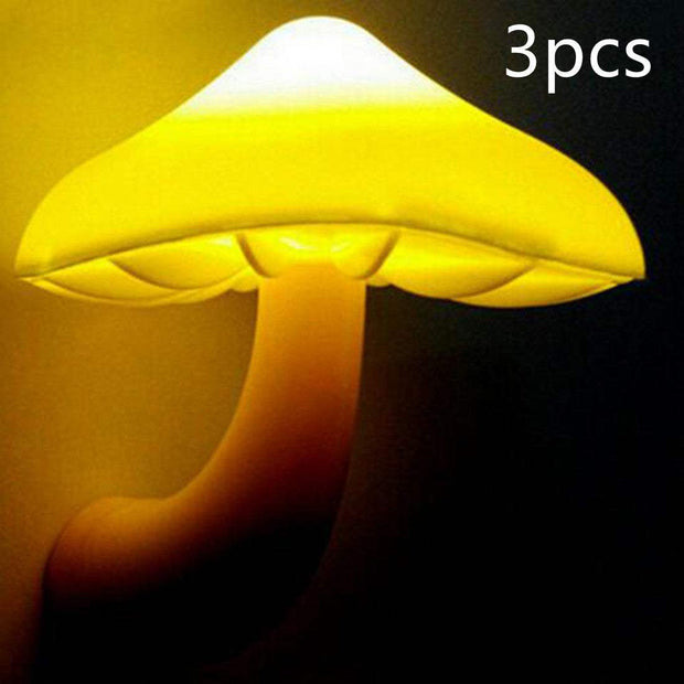 Mushroom-shaped LED night light emitting warm yellow glow, suitable for bedrooms with EU and US plug compatibility.